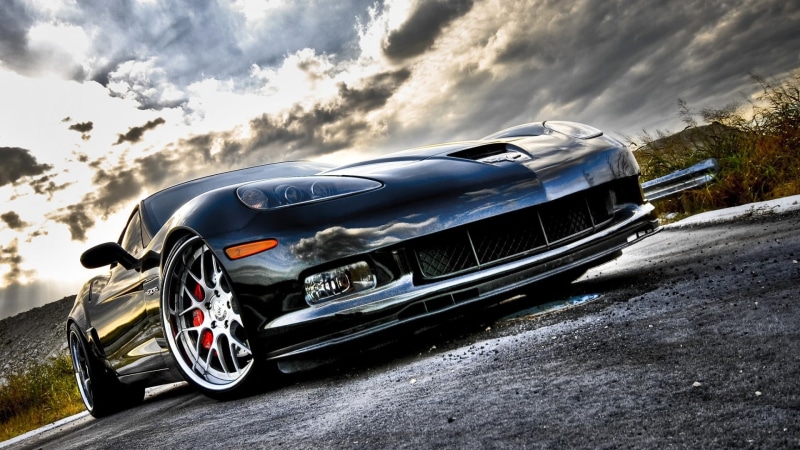 metal, engine, outdoors, sky, modern, motion, automobile, race, sunlight, motor vehicle, shiny, no people, racing, wheel, nature, sport, stationary, transport