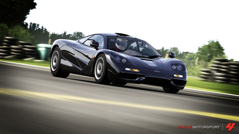 blurred motion, no people, plant, tree, symbol, motor vehicle, luxury, car, day, nature, road trip, transportation, race tracks, McLaren F1, black, motion