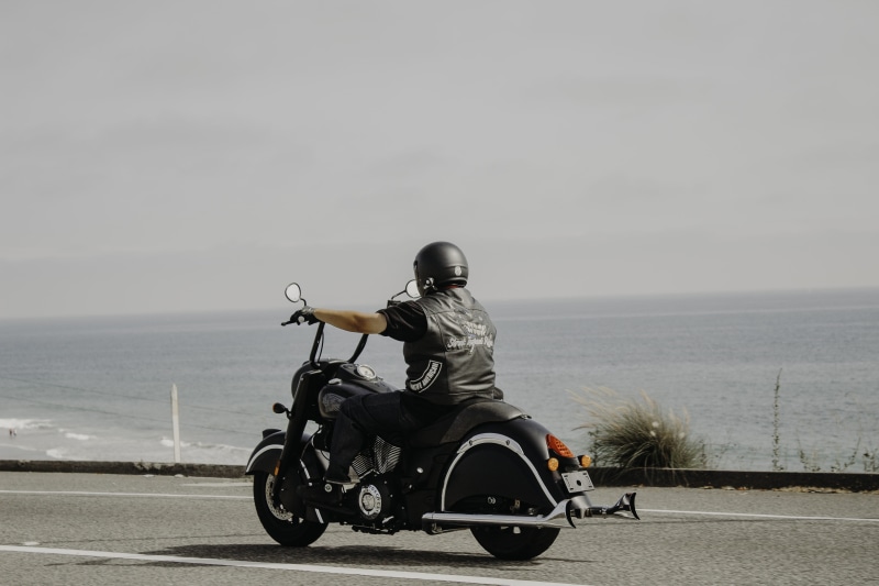 person, man, riding, ride, 5K, crash helmet, day, highway, water, horizon, nature, land vehicle, road, leisure activity, ocean, lifestyles, seaside, speed