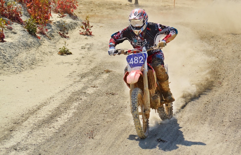 adults only, man, one animal, mammal, dust, mature men, speed, competition, motorbike, action, championship, outdoors, males, sand, one man only, rider