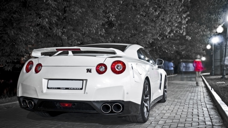 mode of transportation, car, land vehicle, white, sports car, street, focus on foreground, retro styled, headlight, incidental people, Nissan GTR, motor vehicle