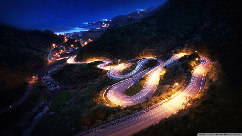 dusk, mountain range, mountain, hill, light, view, light trail, scenics - nature, tail light, sky, no people, long exposure, winding road, beauty in nature