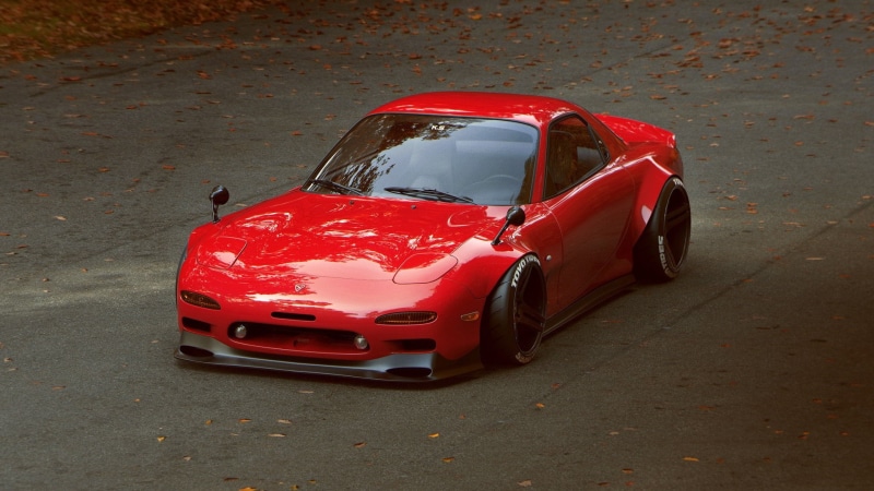 no people, road, car, city, motor vehicle, mode of transportation, red car, outdoors, mazda rx7, street, red, luxury, land vehicle, high angle view, travel