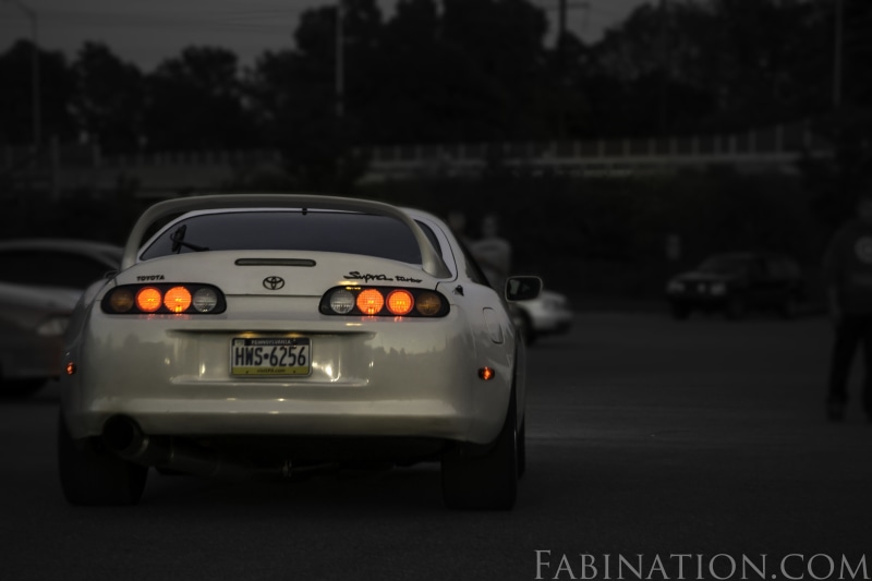 asphalt, outdoors, no people, mode of transportation, stationary, 4K, tail light, motor vehicle, tree, street, toy, night, city, focus on foreground, transportation