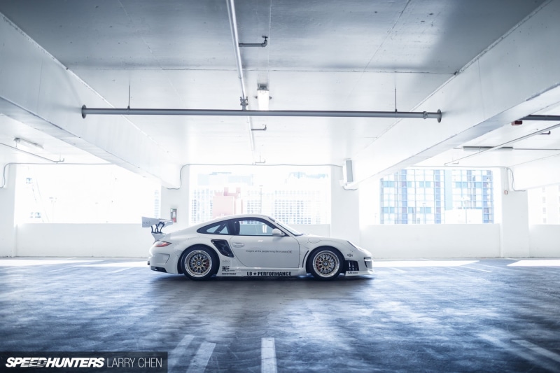 parking lot, absence, parking, garage, Porsche 997, land vehicle, LB Performance, indoors, car, white color, 1080P, toy, no people, motor vehicle, domestic room