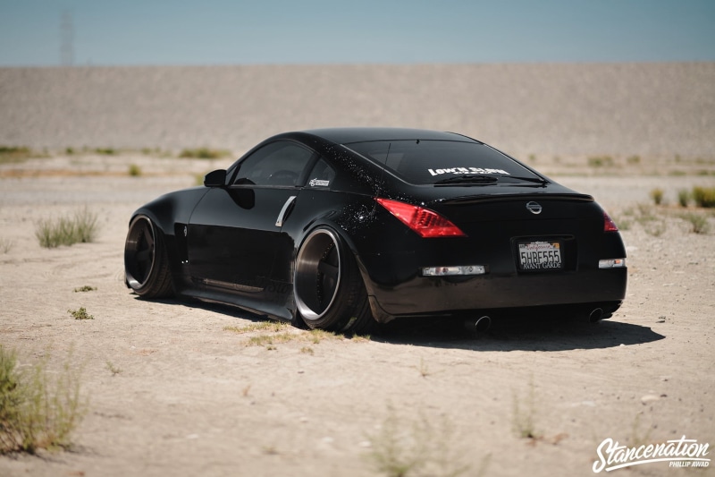 Stanceworks, motor vehicle, car, field, land vehicle, Nissan, mode of transportation, wheel, road, competition, sunlight, sky, day, environment, sport