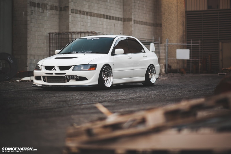 Mitsubishi Lancer EVO, architecture, selective focus, city, day, 720P, car, built structure, street, wheel, white color, road, toy, surface level, luxury