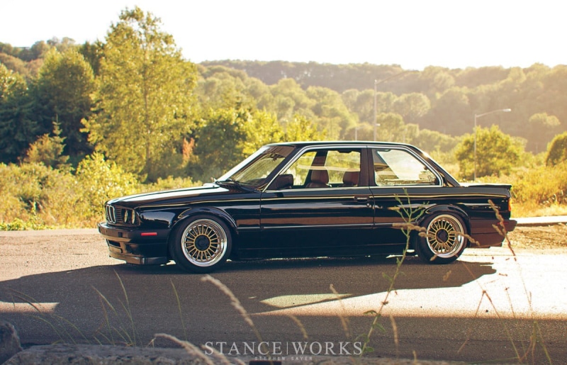 transportation, car, day, advertisemet, BMW, motor vehicle, mode of transportation, retro styled, BMW E30, travel, sky, plant, stance, sunlight, land vehicle