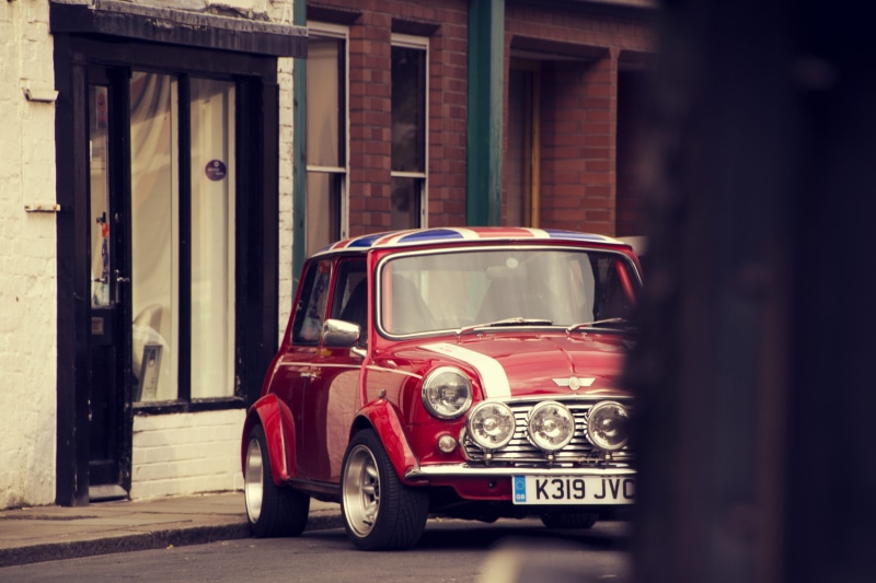 garage, no people, red car, architecture, rally car, land vehicle, building exterior, day, italian job, rally, red, transportation, motor vehicle, old