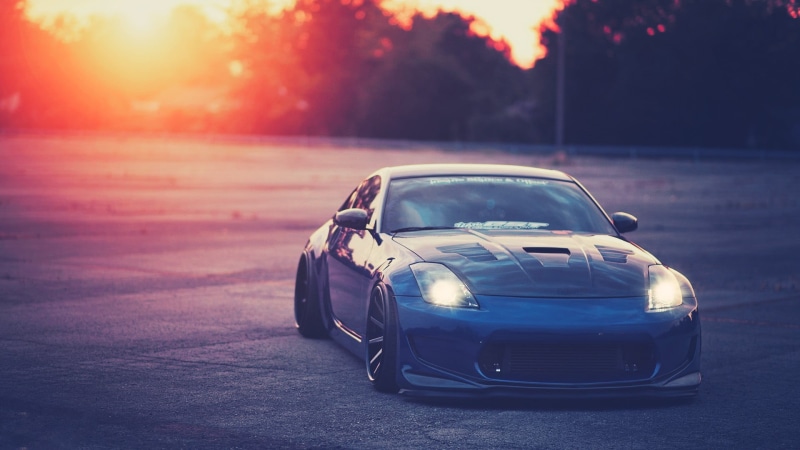 alloy Wheel, mode of transportation, vehicle, Nissan, bumper, black Color, sunset, side View, transportation, rear-View Mirror, red, looking At View, Nissan 350Z