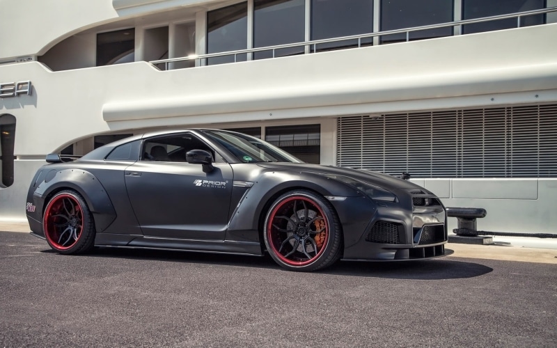 vehicle, retro styled, wealth, no people, stationary, motor vehicle, outdoors, Nissan GT-R R35, mode of transportation, modern, garage, transportation