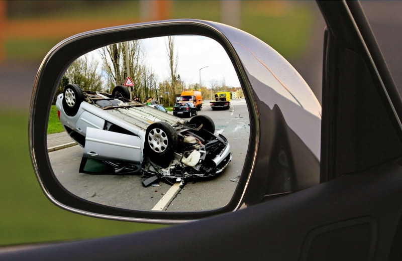outdoors, side-view mirror, glass - material, close-up, mode of transportation, travel, vehicle interior, car, road, manhunt, city, accident, criminal