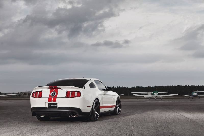 coupe, parking Lot, mode of transportation, shelby, business, day, asphalt, no People, speed, red, mustang, car, accidents and disasters, editorial, city