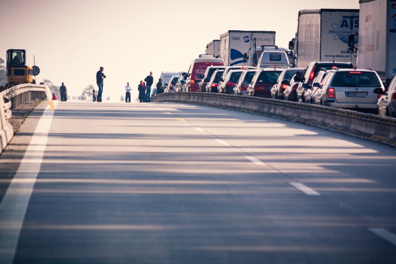 driving, transport, outdoors, brake lights, travel, public transportation, construction work, large group of people, automotive, transportation system
