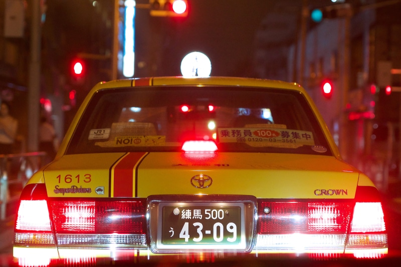 illuminated, land vehicle, photo, urban, night, public transportation, motor vehicle, text, mode of transportation, crown, toyota, accidents and disasters