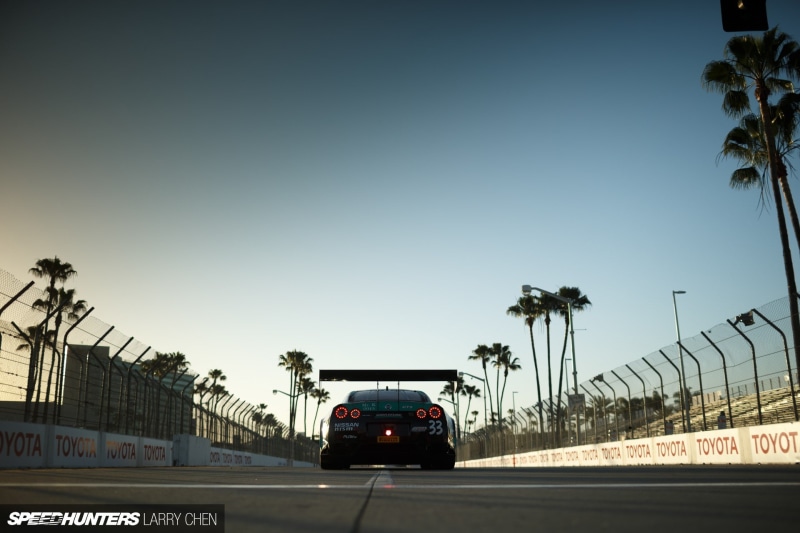 Nissan GT-R NISMO, plant, sky, architecture, Nissan GT-R, sign, motor vehicle, motion, palm tree, car, tree, day, 1080P, nature, land vehicle, Nismo, street