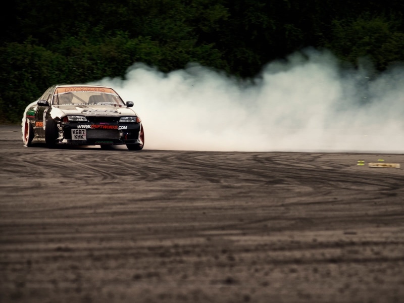 Nissan GT-R R32, racecar, sports utility vehicle, day, professional sport, speed, vehicle, travel, smoke - physical structure, auto racing, 720P, motorsport