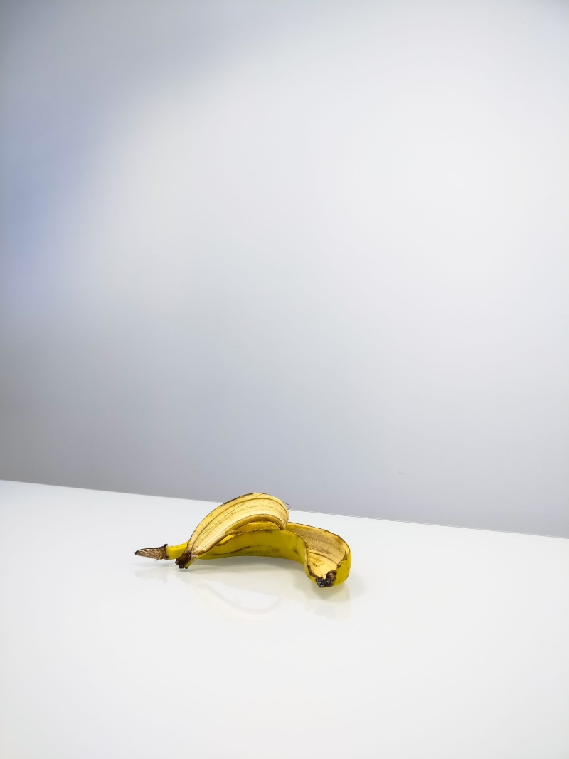 no people, produce, white background, indoors, fruit, plant, single object, peanut butter, white board, still life, pineapple, banana peel, freshness