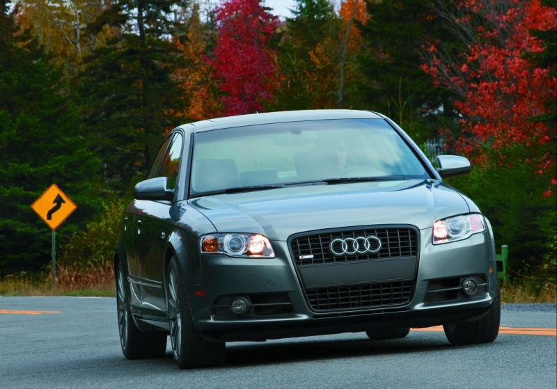 land vehicle, travel, retro styled, careless, vintage car, audi, nature, city, motor vehicle, outdoors, day, stationary, mode of transportation, no people