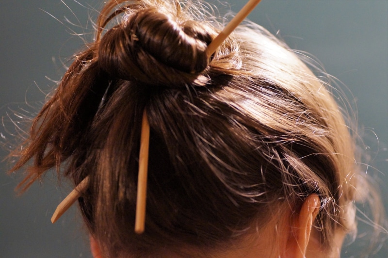 beauty, chopstick, day, women, indoors, one person, headshot, rear view, portrait, human head, chinese chopsticks, girl, braided, studio shot, brown, young