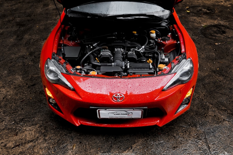 Toyota, high angle view, stationary, no people, 5K, garage, day, parking, mode of transportation, car, number, close-up, land, Toyota GT-86, motor vehicle