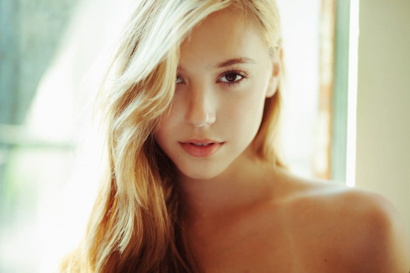 looking at viewer, portrait, smiling, Alexis Ren, body part, blonde, hair, s, one person, looking at camera, child, beautiful woman, human body part, adult
