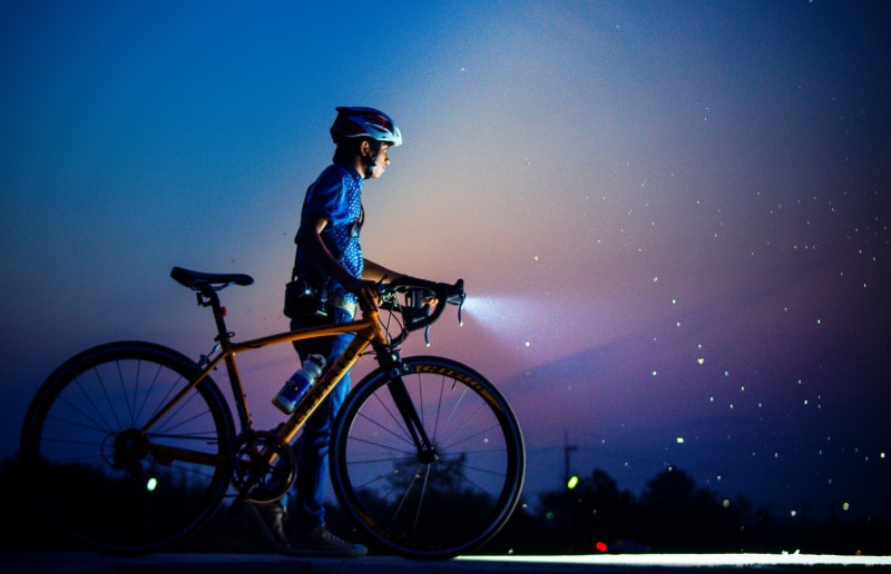 home, night, one woman only, travel, mens, holding, mode of transportation, bicycle, one person, transportation, brown, man, clothing, hobbies, a photographer