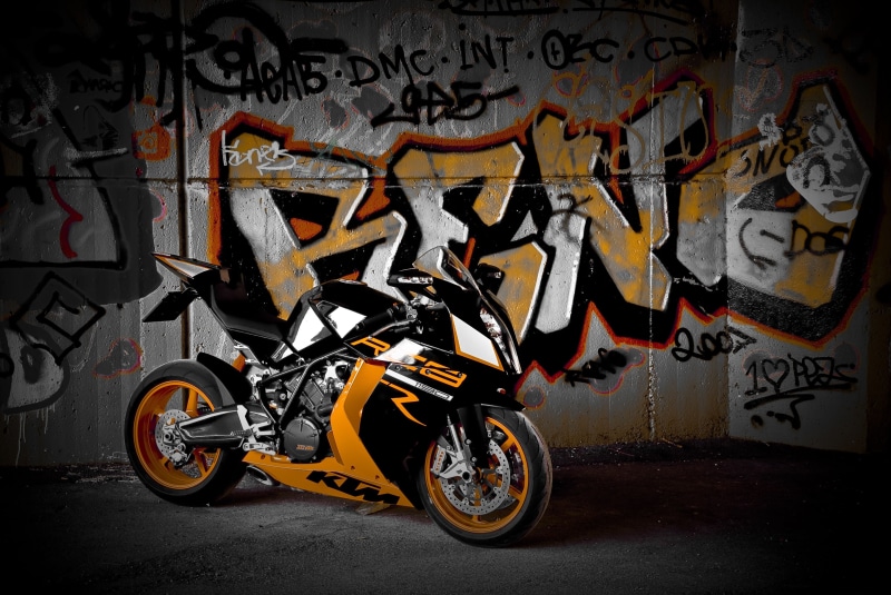 road, communication, cycling, western script, no People, rc8 r, wall - building feature, transportation, orange, mode of Transport, black, wheel, Supersport