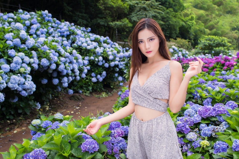 women, beauty in nature, nature, young women, outdoors, adult, women outdoors, real people, purple, beauty, looking at camera, plant, hair, three quarter length