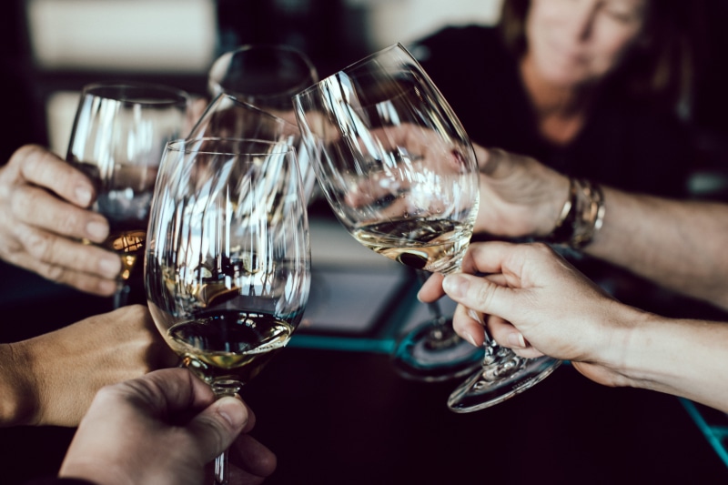 celebratory toast, human body part, men, glasses, indoors, refreshment, drink, cheers, red wine, wineglass, hand, business, 5K, adult, holding, drinking