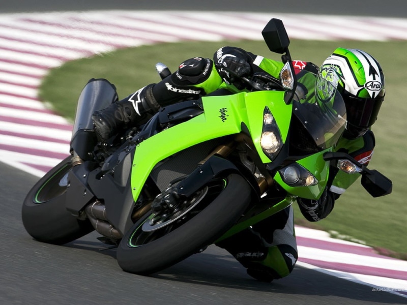 real people, land vehicle, speed, one person, sports equipment, outdoors, focus on foreground, lifestyles, riding, helmet, sports helmet, black color, crash helmet
