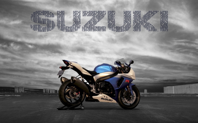 motion, one person, Suzuki GSX-R, road, blurred motion, mode of transportation, transportation, communication, full length, sign, real people, nature, western script