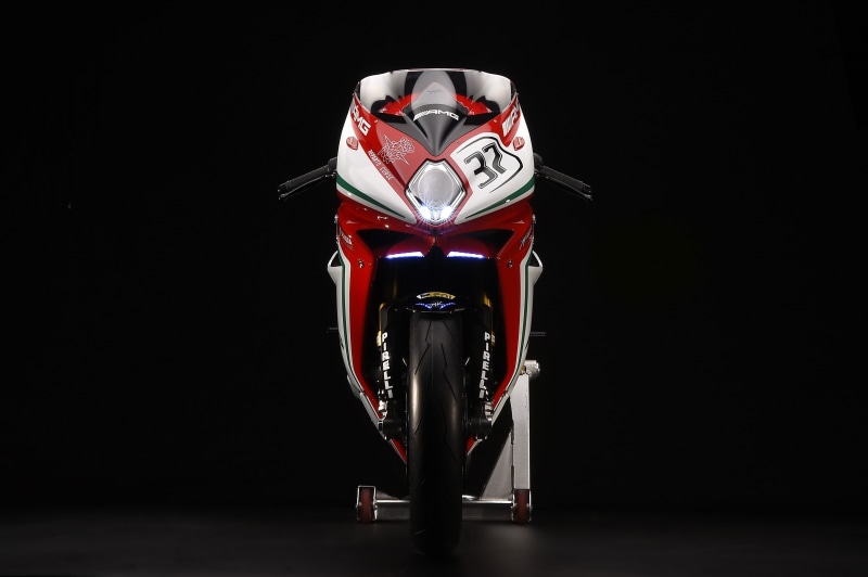one person, close-up, representation, MV agusta, red, AMG Line, studio shot, adult, success, exhaust pipes, arts culture and entertainment, superbike, full length