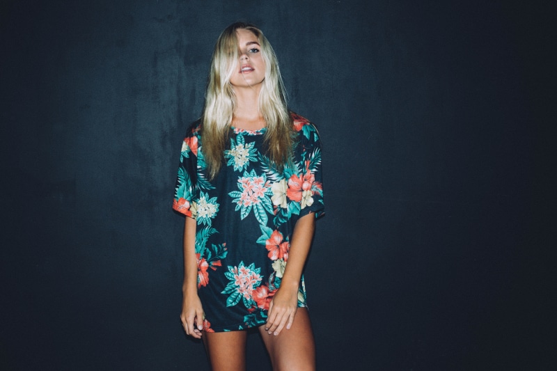 adult, standing, front view, beautiful woman, one person, floral, hairstyle, women, hair, blue eyes, long hair, blond hair, model, looking at viewer, shirt
