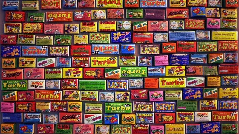 full frame, close-up, creativity, abundance, lot, pattern, in a row, yellow, large group of objects, design, bubblegum, assorted, communication, wall - building feature