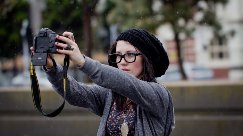 young adult, selfies, s, holding, digital camera, technology, activity, lifestyles, teenager, casual clothing, camera - photographic equipment, beanie