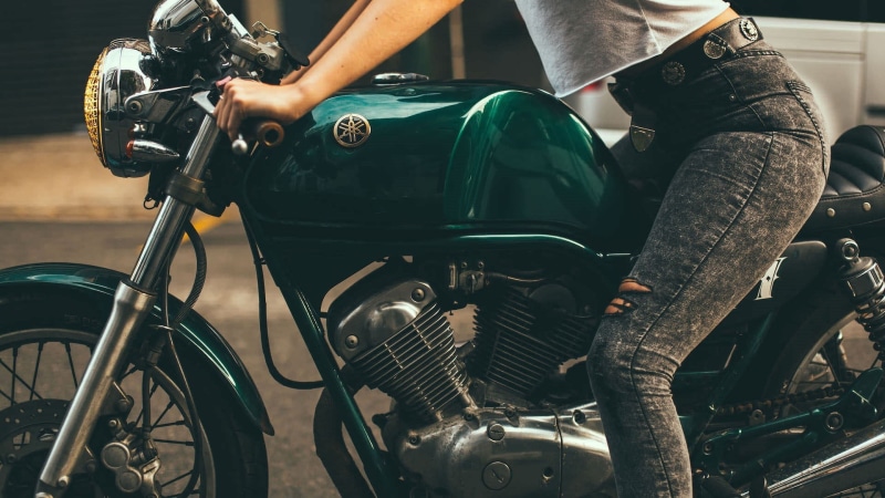 speeder bike, midsection, real people, Yamaha, green, model, low section, 1080P, sunlight, bobber, vehicle, transportation, lifestyles, men, torn jeans