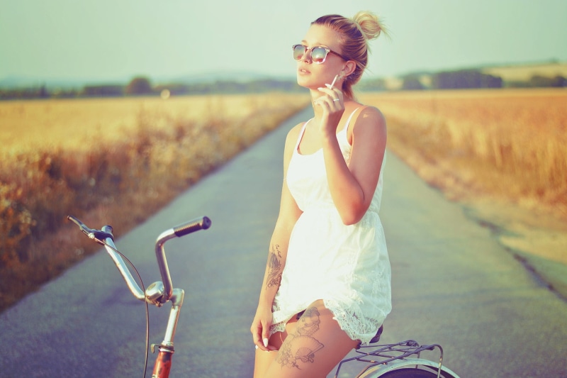 cigars, real people, day, transportation, casual clothing, model, fashion, adult, women, beautiful woman, 1080P, women with glasses, bicycle, three quarter length