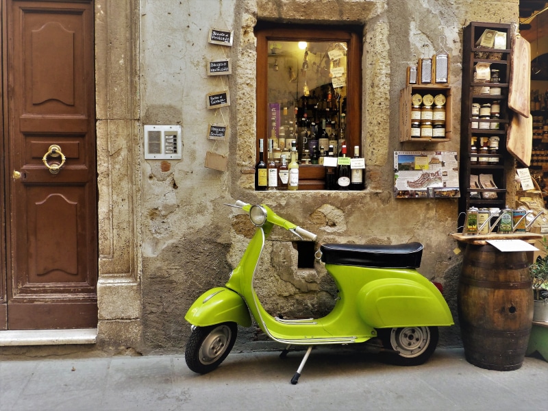 bench, retro styled, mode of transport, locomotion, building exterior, two wheeled vehicle, handlebars, shopping, spotlight, barrel, stationary, beside