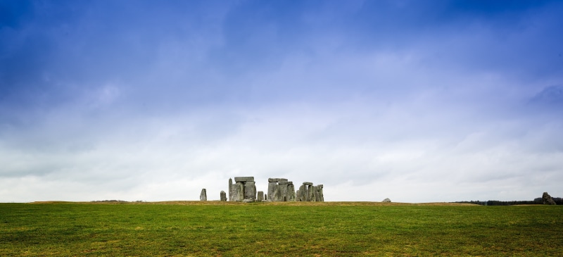 built structure, stone Material, grass, no people, building exterior, stone henge, the past, history, tourism, landscape, outdoors, famous Place, tourist