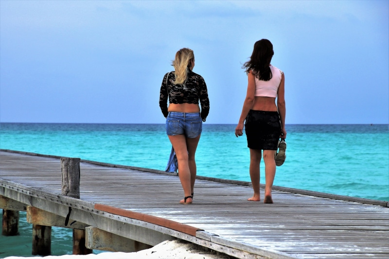 sunny, full length, two people, peace of mind, daytime, travel, maldives, leisure activity, clothing, the coast, rear view, the sun, sand, conversation