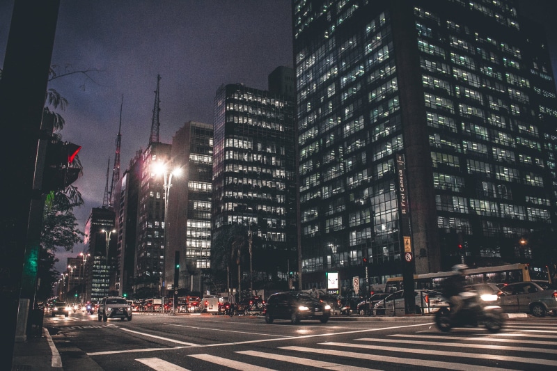 mode of transportation, sky, manhattan - New York City, travel, street light, tall - high, traffic, cars, office building exterior, car, night, pedestrian crossing