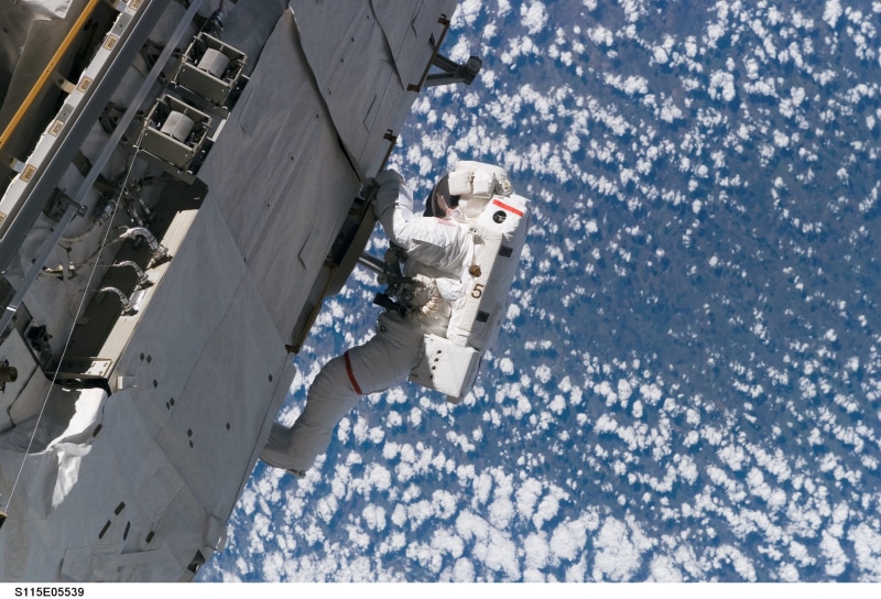 Spacewalk, day, mode of transportation, floating, suit, sky, cold temperature, water, flying, single object, air vehicle, 2K, pack, satellite view, aerospace industry
