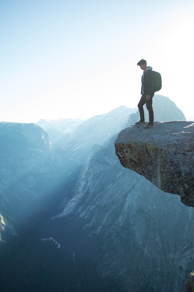 tranquility, scenics - nature, activity, one person, cloud, ridge, mountain range, rock, climbing, man, adventure, hiking, mountain Peak, vacations, lifestyles