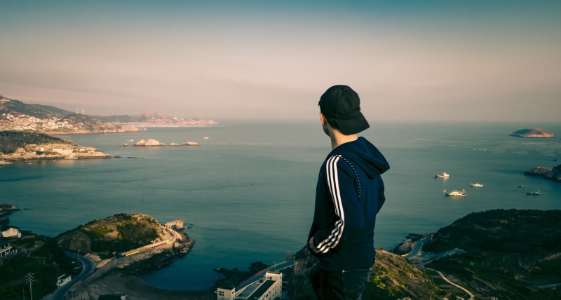 landscape, outdoors, clouds, lifestyles, hairstyle, leisure activity, ocean, sea, people, beauty in nature, three quarter length, real people, man, scenics - nature