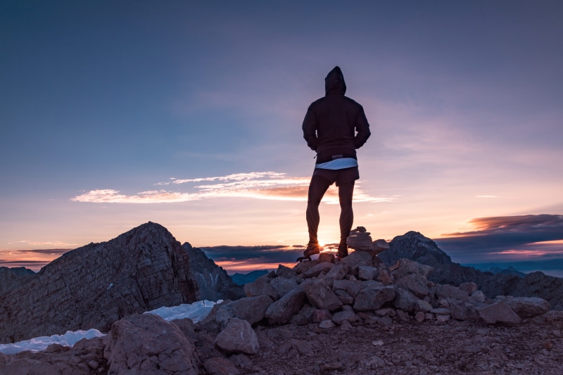 scenics - nature, hiking, watching, sunset, hiker, real people, silhouette, exploration, solid, man, lifestyles, outdoors, sport, beauty in nature, sunrise