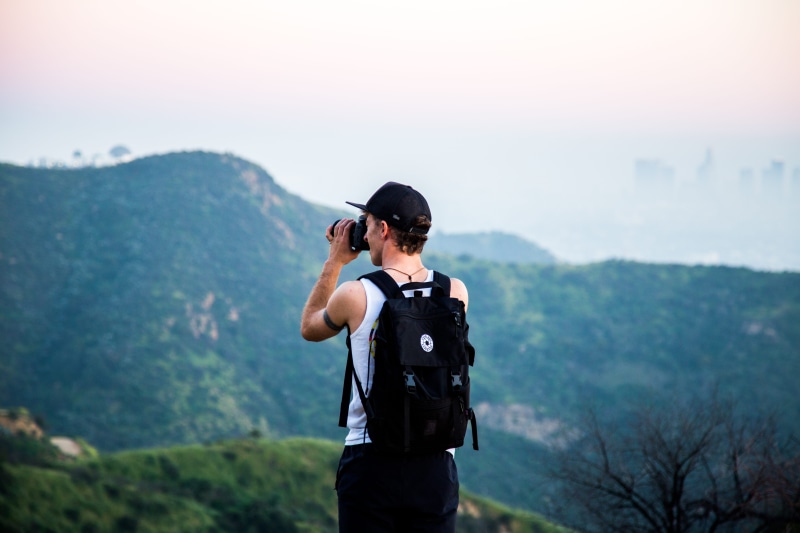 stands, hiking, scenics - nature, standing, backpacker, travel, recreational Pursuit, scenics, daytime, technology, summer, shallow focus, mountain range