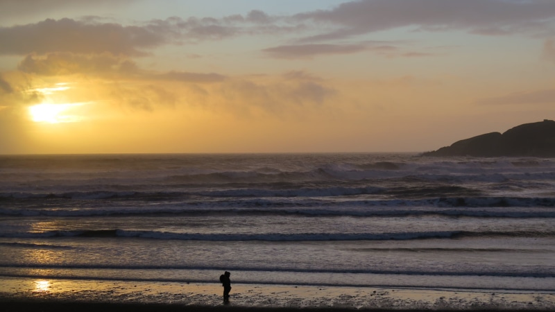 man, horizon, outdoors, idyllic, landscape, sun, person, dusk, scenics, sunset, seashore, people, wave, tranquil scene, standing, tranquility, shadow, ocean