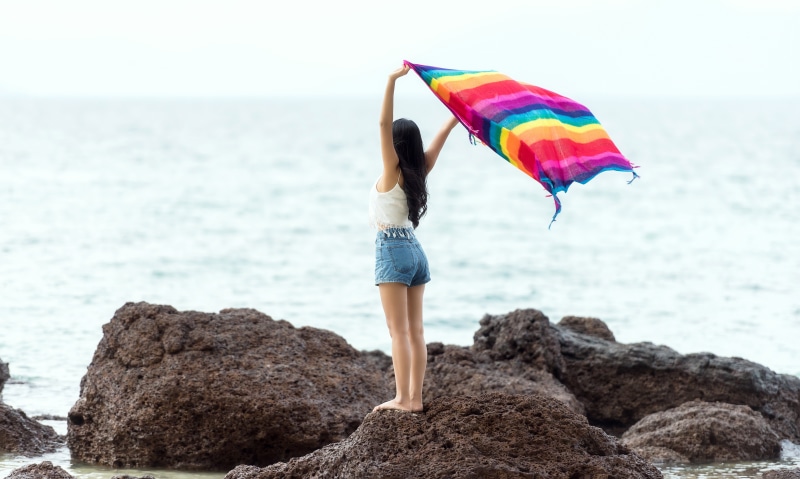 public domain, leisure activity, ocean, people, caucasian Ethnicity, adult, one Person, umbrella, rock - object, real people, vacations, 5K, outdoors