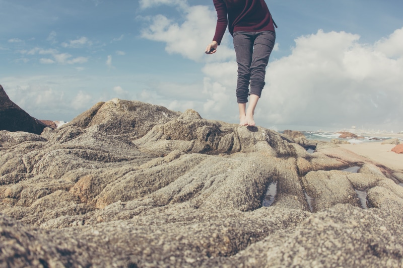 outdoors, rock - Object, leisure activity, people, 5K, motion, brown soil, human body part, black, near, landscape photography, land, woman, daytime, limb